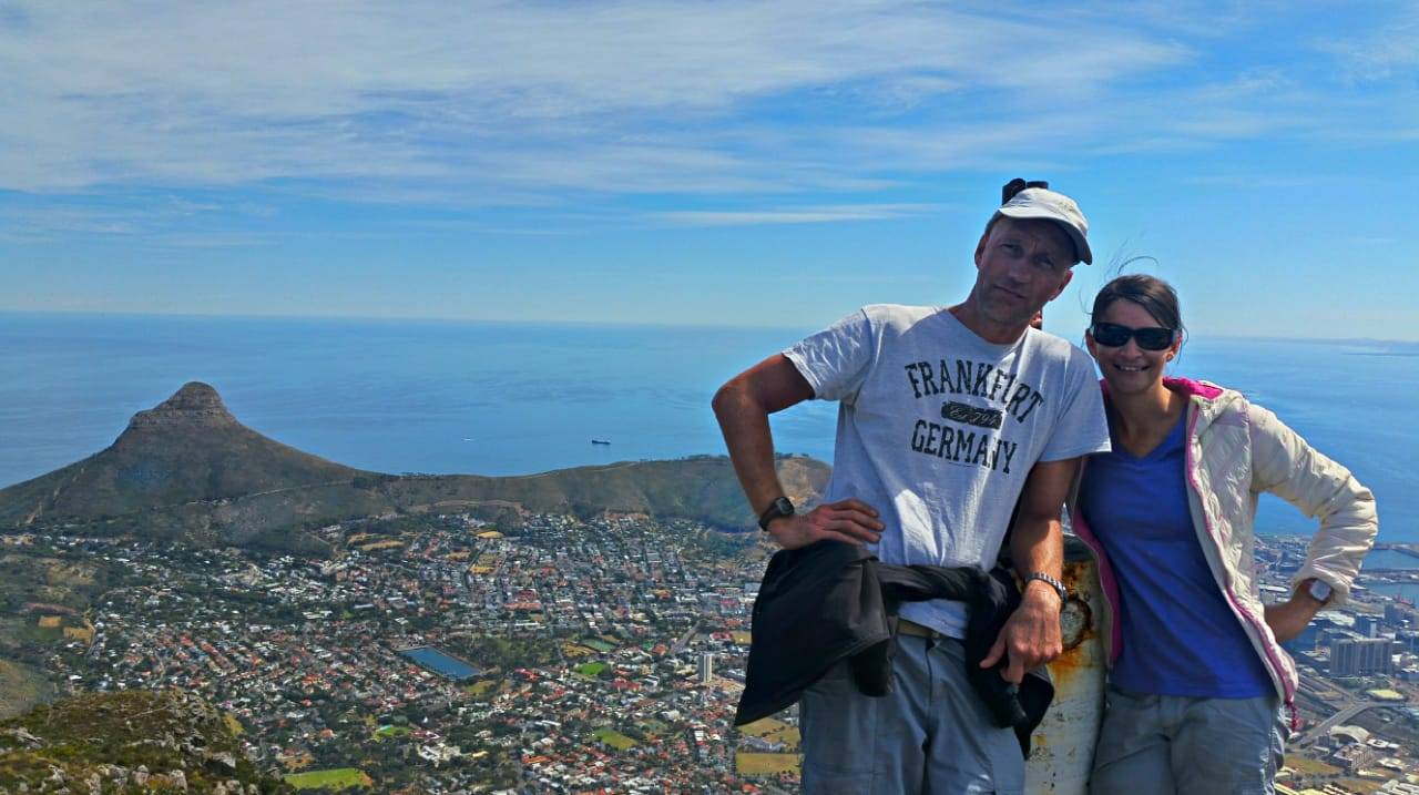 Like2Hike's guides, standing on top of Devil's Peak, with Cape Town in the background
